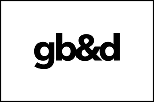 Black lowercase letters gb&d in bold font are centered on a white background with a thin black border around the image.